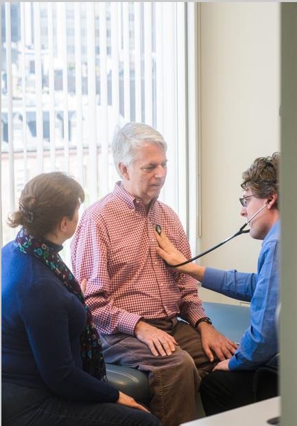 Stephen (center) and Jane visit with neurologist James D. Berry, MD, MPH, at the Mass General ALS Multidisciplinary Clinic.