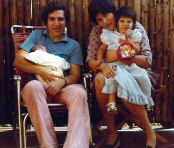 Charlie and Ruth Michaelson in 1976 with their daughters, Dena (one week old) and Elizabeth (three and a half years old). 