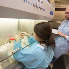 Akita Joshi (left) and Derek Bielawski, both senior medical technicians, took part in a recent drill to practice Ebola readiness procedures at Mass General's Microbiology Biothreats Laboratory.