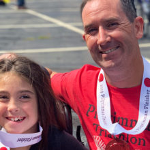 Team Abby Mac is made up of Greg MacCurtain and his nine-year-old daughter, Abby. The father-daughter running team started when Abby was five.