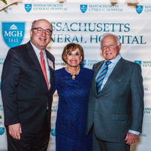 At a reception, Peter L. Slavin, MD, (left), Mass General' s president, personally thanked philanthropists James S. and Carol J. Herscot for a half century of generous support, including a new $50 million gift. (Photo by Alethia Williams)