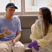 Meaghan Ekstrom, RN spends time connecting with oncology patient, Tom Furdon, of Sudbury, Massachusetts.