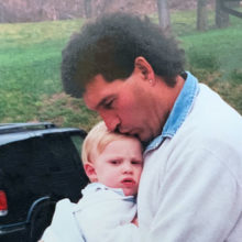 A young Zack Johnson with his father, Jeff, at his Canandaigua, NY home. Photo by Pamela C Johnson.