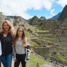 Before being diagnosed with cholangiocarcinoma, Jacqui Lewis (center) traveled often with her son, Evan Lewis, and daughter, Anjelina Lewis, including to Machu Picchu in Peru.