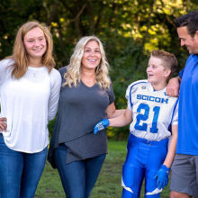 Jett Rehm (second from right) with his sister, Ali, and parents, Kerri and John
