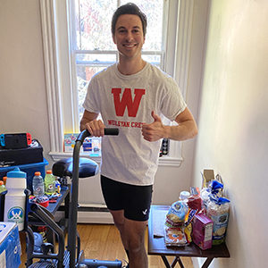 Jon Rossi with his air bike and an array of snacks.