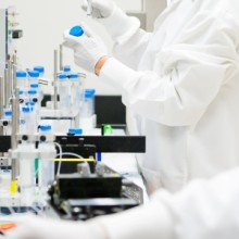 Lab - two technicians at equipment