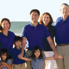 Front row (left to right): Owen GwinnLandry, Phinley GwinnLandry, Eli GwinnLandry, Zoe Le, Kai Le, Katie Le (arms outstretched) and Azlan Landry. Back row (left to right): Mark GwinnLandry, Kim GwinnLandry (holding Reese GwinnLandry), Jen Le, Khoa Le, Barrie Landry, Kevin Landry, Kamron Landry and Chris Landry.