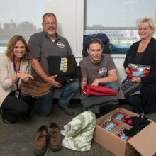 From right: Wendy Morrissey, her son Billy Morrissey, his stepfather Geno Arsenault and Bridge Clinic Director Laura Kehoe, MD.