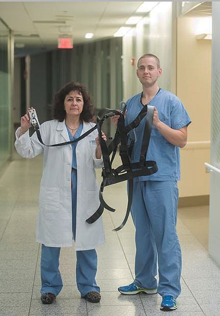 Innovation specialist Hiyam Nadel, RN, MBA, left, has worked with Jared Jordan, RN, to refine his idea for a harness system designed to prevent patients from falling in bathrooms.