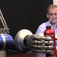 Cathy Hutchinson used a robot arm to serve herself a drink for the first time in 15 years.