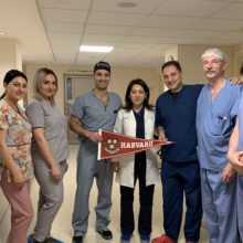 Members of a team from Mass General and Harvard pictured with staff at a laser clinic in Armenia.