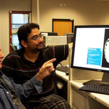 Martinos Center researchers (from left) David Cohen, PhD, and Sheraz Khan, PhD