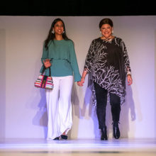 Lisa Sisco (right) walked the runway with her oncologist, Lipika Goyal, MD. Lisa is receiving chemotherapy for a rare form of cancer called cholangiocarcinoma.