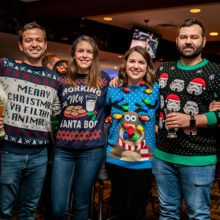 L-R: Kristen Curran, Andrew Curran, Victoria Kane, Elizabeth Schwartz, Tom Curran, Liz Curran at the Ugly Christmas Sweater Bar Crawl in December. Photo: Amanda Kowalski