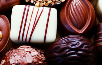 Dark chocolate has the greatest health benefits because it contains the most cocoa. White chocolate however, does not.