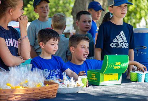 Patrick (foreground left) and Liam Doherty at Liam’s Lemonade Stand. Liam, who has Crohn's disease, devotes proceeds to fighting the condition.