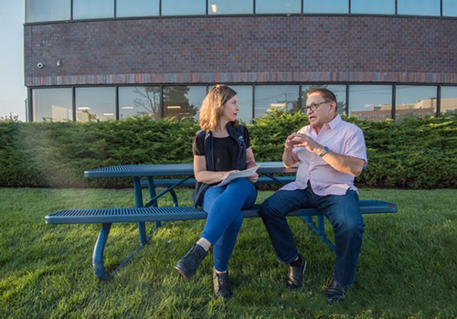 Outside the Mass General Chelsea HealthCare Center, Raina meets with Anthony DePlacido, of East Boston, who is in recovery from alcohol use disorder. 