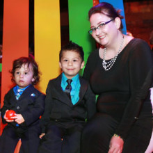 At the Storybook Ball, pediatrician Rebecca Cronin, MD, posed with her patients Daniel Ortiz Cisneros, 2 (left), and his brother Alex, 4, of Chelsea.