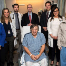 Kevin Daignault (center) with members of his heart transplantcare team including, from left, Janice Camuso, RN; Karen Turvey, CNP; Johannes Steiner, MD; David D'Alessandro, MD; Greg Lewis, MD; Kerry Gaj, NP; and Katie Stettner, PA.